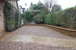 Sweeping sandstone path installed leading to front door, driveway perimeter edged with sandstone setts all hand pointed, Natural sandstone wall constructed with crease tile and 6mm Scottish beach gravel installed to 