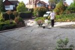 BEFORE: Driveway is excavated and hardcore based and construction is in progress 