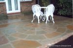 Sandstone patio with circle feature and squaring of kit 