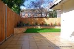 Curved brick planter wall using old stock bricks with single bull nose capping