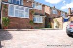 Driveway installed with Tegula paving with added jumper block, kerbs installed to retain split levels and feature circle lawn and fencing installed.