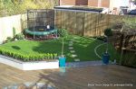 Interlocking lawn circles edged with granite setts