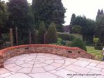 Tumbled sandstone installed to match character property