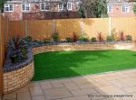 Curved brick planter wall using old stock bricks with single bull nose capping