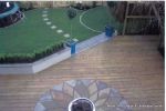 Interlocking lawn circles edged with granite setts