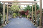 Town house garden paved with black limestone 