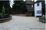 New driveway installed using Marshall's Tegula paving with contrasting charcoal border