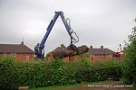 Before: We delivered the oak trunk to a school nursery and had it craned into the grounds