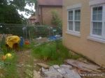 BEFORE: The front of the property was a mess after the building works with rubbish and clay everywhere