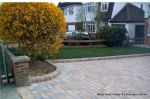 New driveway installed using Marshall's Tegula paving with contrasting charcoal border