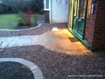 AFTER: Sweeping sandstone path installed leading to front door, driveway perimeter edged with sandstone setts all hand pointed, Natural sandstone wall constructed with crease tile and 6mm Scottish beach gravel installed to drive.