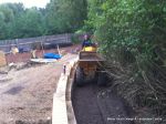 DURING: Ramped pathway built leading from the front of the property to the very rear, retaining walls built with interlocking blocks with added rebar and fresh concrete for strength and faced with house brick