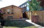 New treated panel fencing and summer house supplied and installed