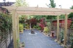 Town house garden paved with black limestone 