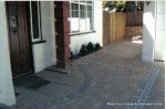 AFTER: New driveway installed using Marshall's Tegula paving with contrasting charcoal border