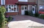 Driveway installed with Marshalls Driveline 50 in brindle with Sweeping curved flower bed