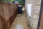 Sweeping sandstone path installed leading to front door, driveway perimeter edged with sandstone setts all hand pointed, Natural sandstone wall constructed with crease tile and 6mm Scottish beach gravel installed to drive