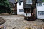 BEFORE: Old concrete driveway broken and crumbling