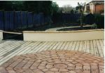 Terracotta tile octagon set in decking