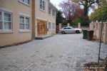 AFTER: Driveway was constructed with tumbled paver's in graphite grey, brick wall and pillars built using matching brick to property   