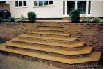 Sandstone patio installed on block & beam floor with octagon steps