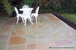 Sandstone patio with circle feature and squaring of kit 