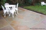 Sandstone patio with circle feature and squaring of kit 